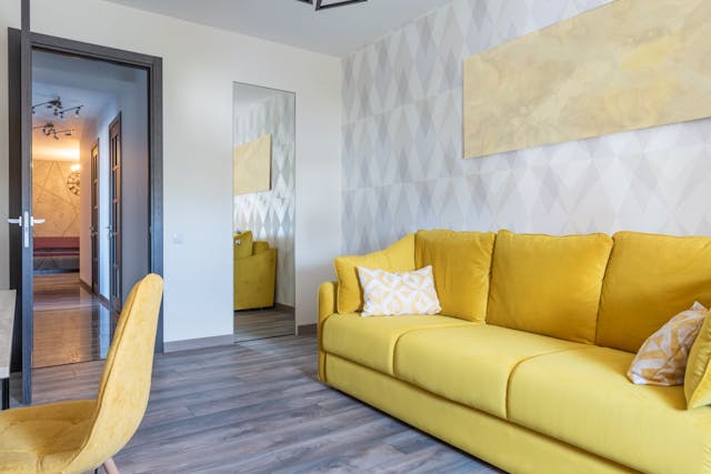 living room with yellow couch