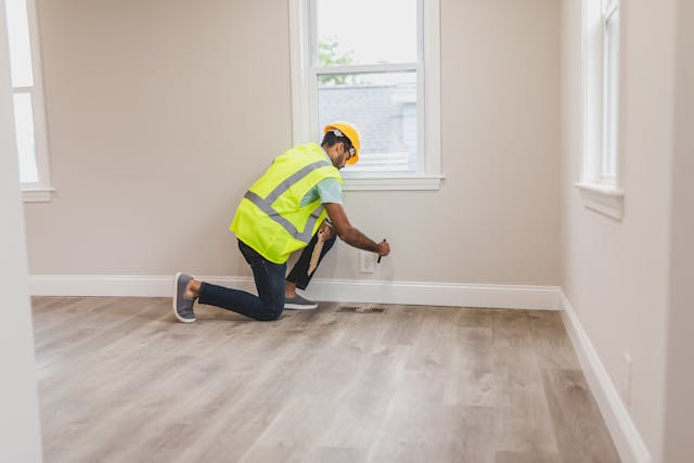 person inspecting empty property 