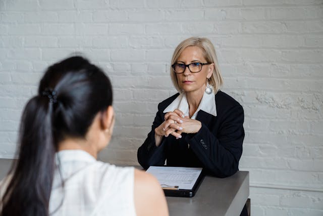  property manager interviewing potential tenant