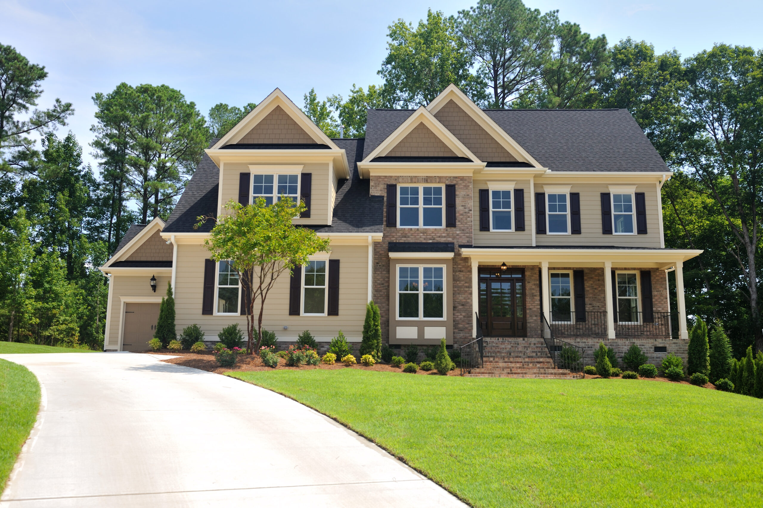 brown-house-curved-driveway