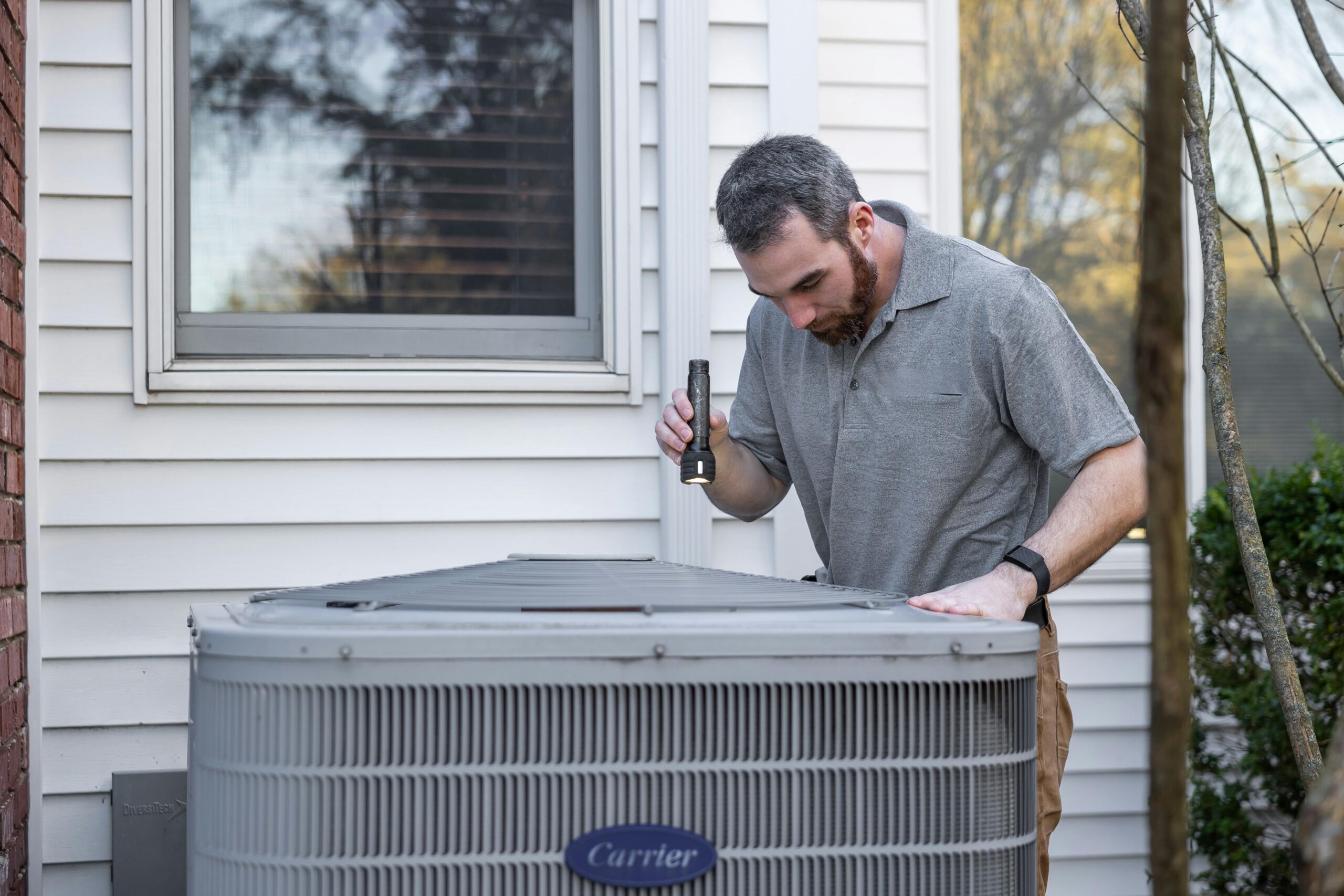hvac-technician-working-on-hvac