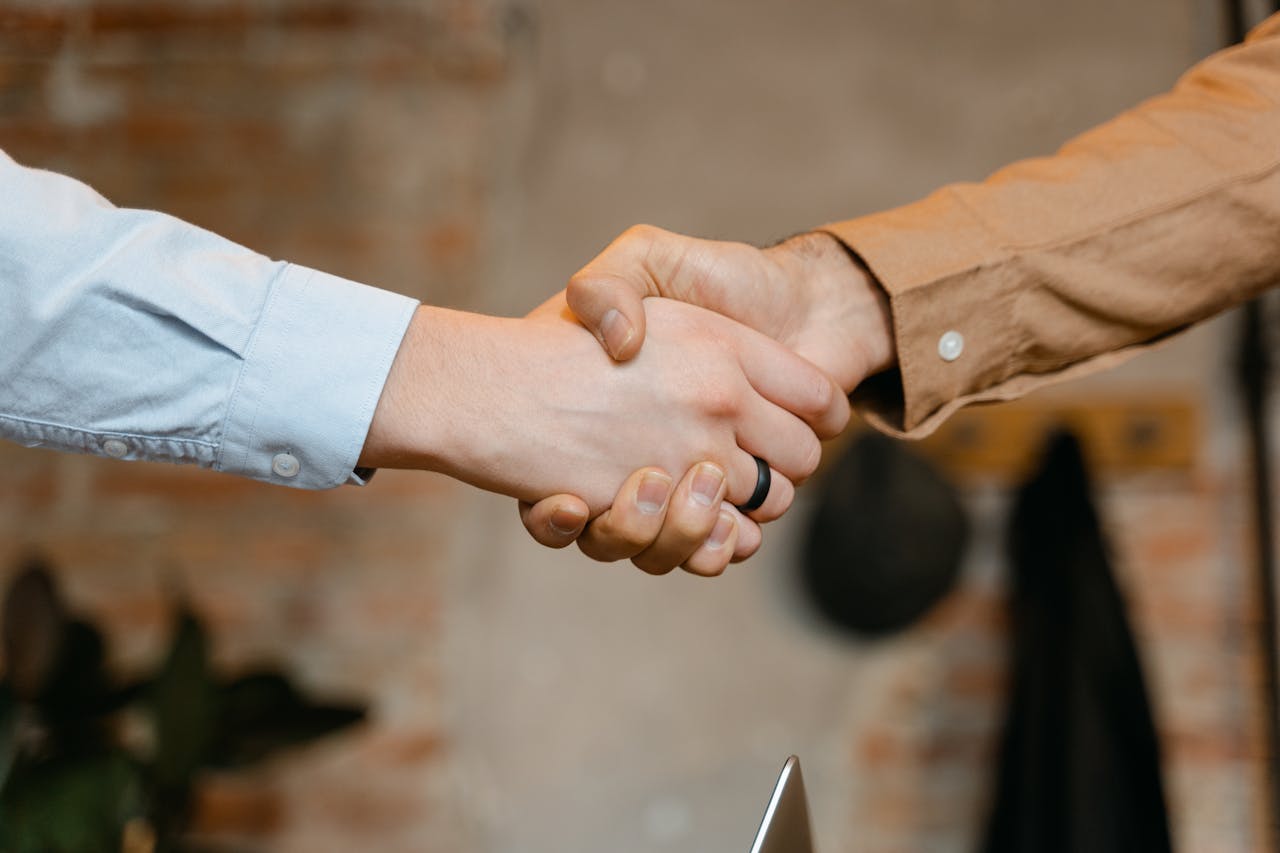 two people shaking hands