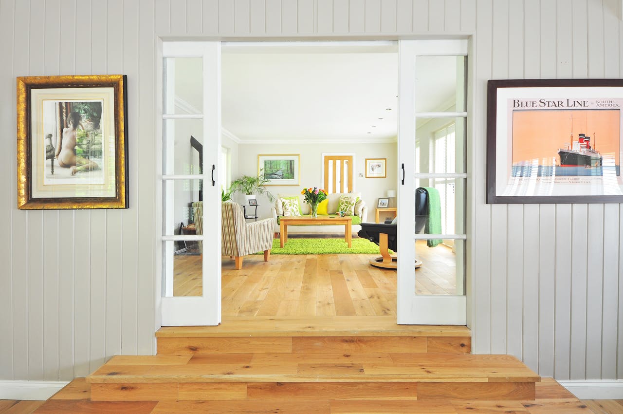 doorway looking into white living room