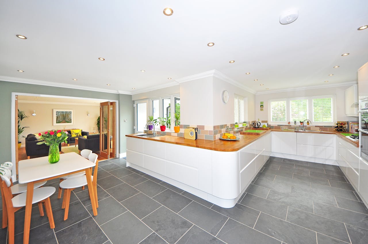 grey floors and white island home interior